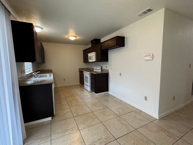 Building Photo - Four Bedroom, Two Bathroom Home For Rent