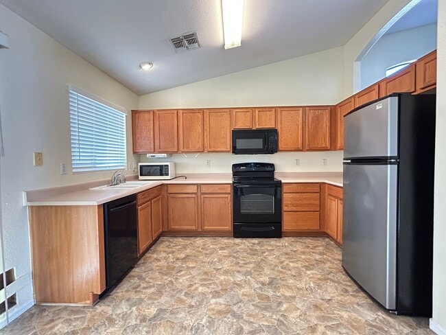 Building Photo - Unique 4 Bedroom, 2 Bathroom with 2 Car Ga...