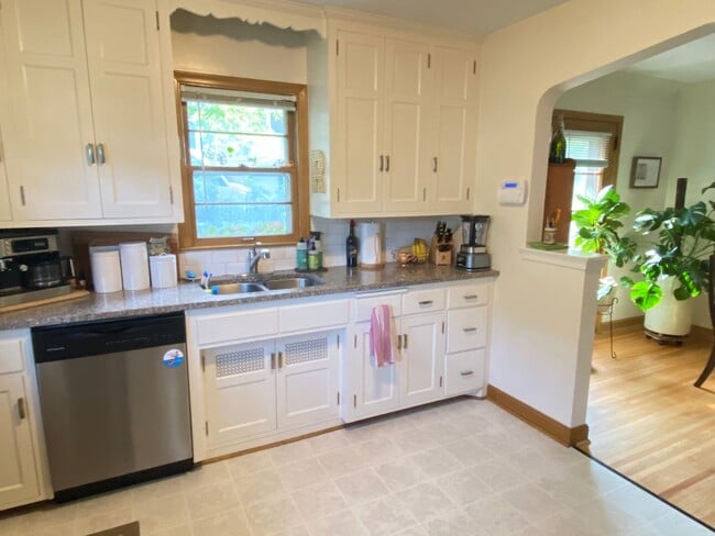 Building Photo - Charming NE Home w/ Two Car Garage