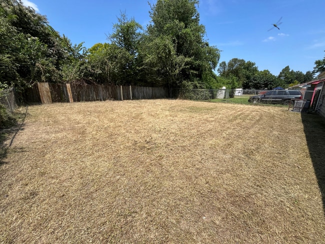 Building Photo - Charming 3BR/2BA Memphis Home | Hardwood Floors, 1-Car Garage & Fenced Yard