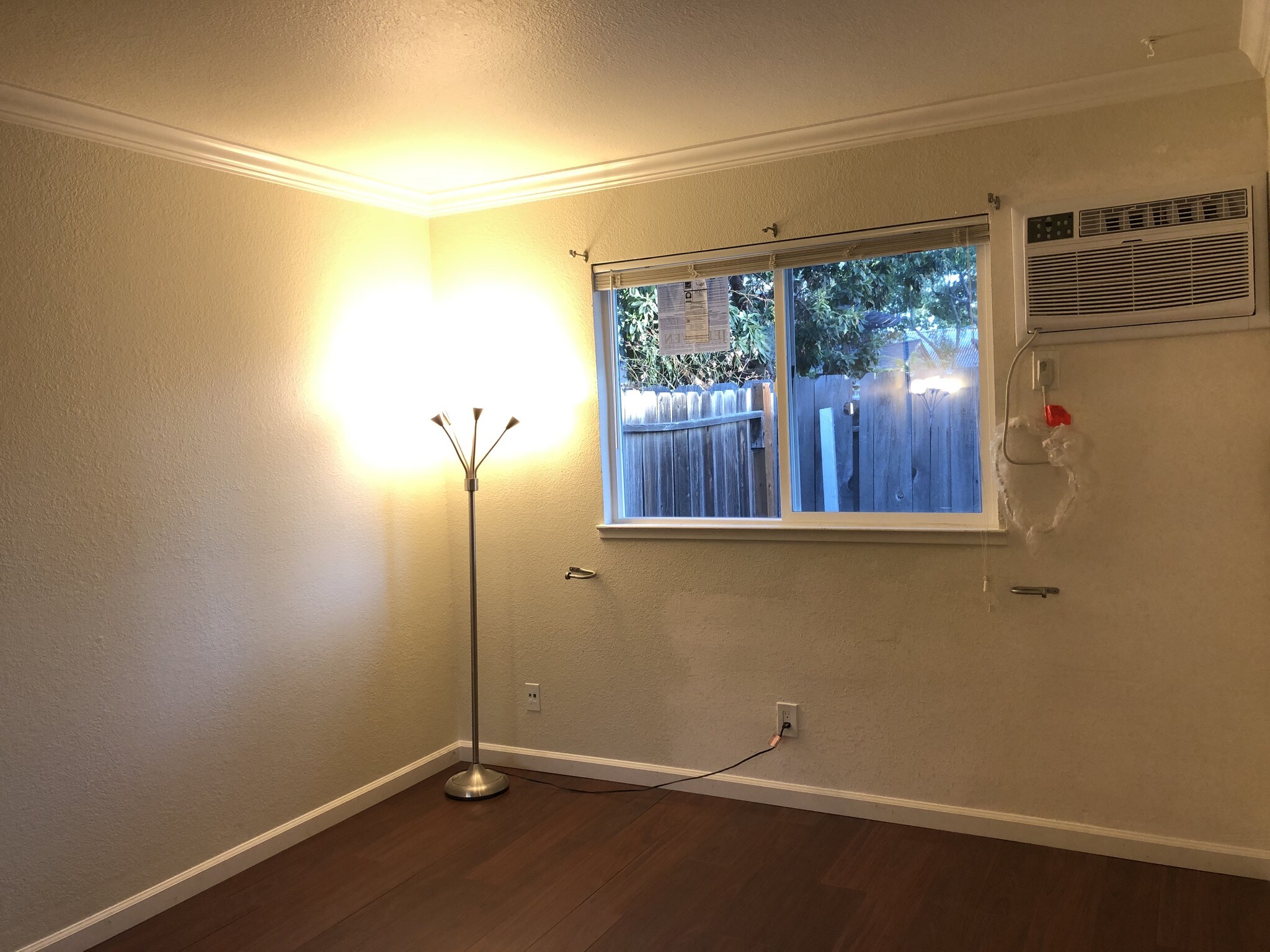Vinyl Plank flooring, window & A/C unite - 375 N M St