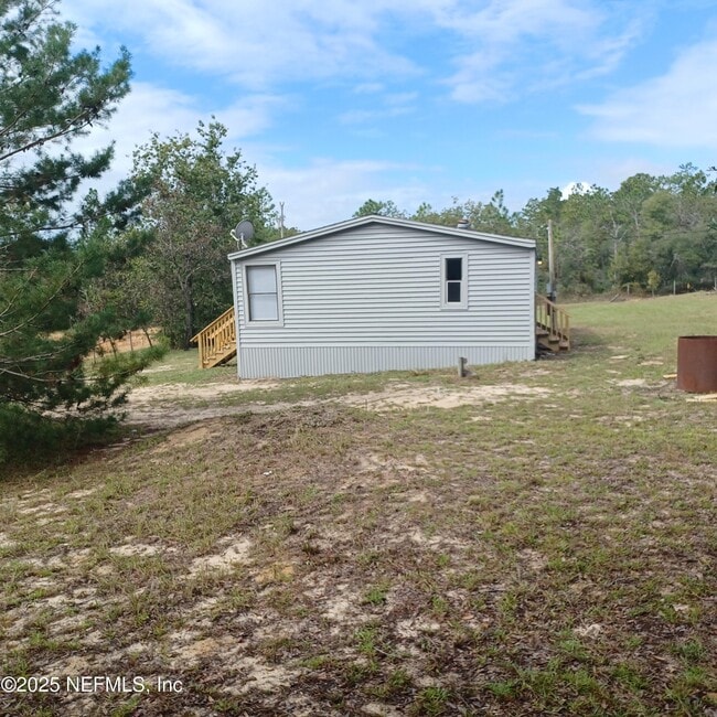 Building Photo - 6184 Cornell Rd