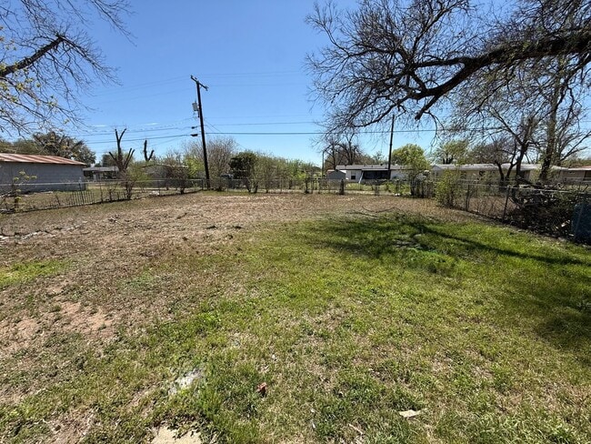 Building Photo - Charming 3BR Home w/ Hardwood Floors & Private Yard – Great SA Location