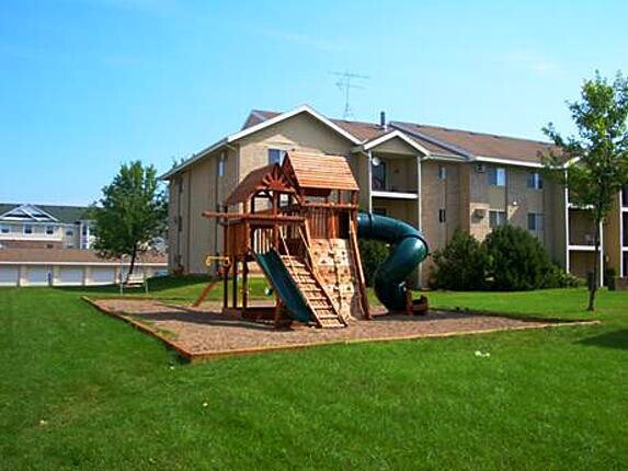 Building Photo - Evergreen  Square Apartments - Free 32" TV & $400 Off!