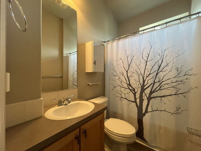 Building Photo - Distinctive 3-Story Tigard Townhouse with Stainless Steel Kitchen, Vaulted Ceilings & Attached 2-...
