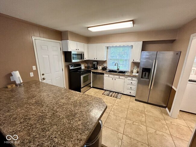 Building Photo - 10329 N Delaware St