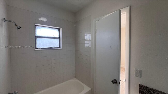 Building Photo - 3675 W 11th Ave