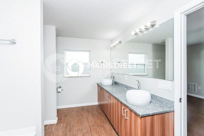 Building Photo - 4 Bedroom Pet-Friendly Home in PALM BAY, FL with Main Street Renewal