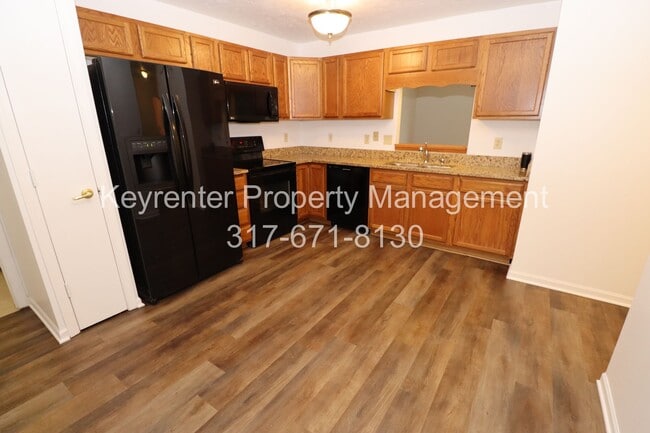 Building Photo - Discover this well-maintained 3-bedroom, 2-bath home in Indianapolis featuring an attached garage...
