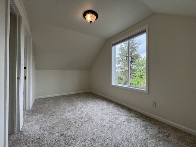 Building Photo - Character-Filled Concordia Home with Flexible Living Spaces & Gas Fireplace