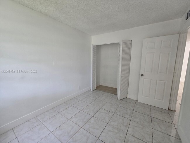 Building Photo - 8700 N Sherman Cir