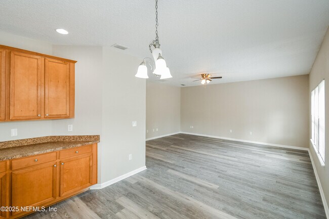 Building Photo - 9370 Jayhawk Ln