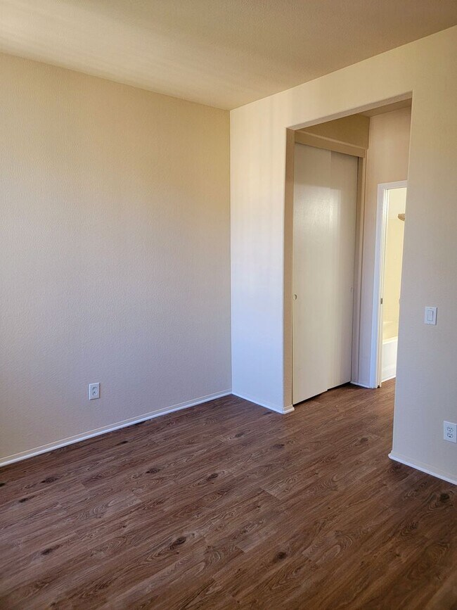 Building Photo - New Vinyl Flooring and Fresh Paint! 2 Bedr...