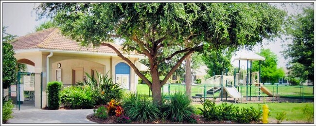 Building Photo - **SUNCOAST LAKES GATED COMMUNITY**