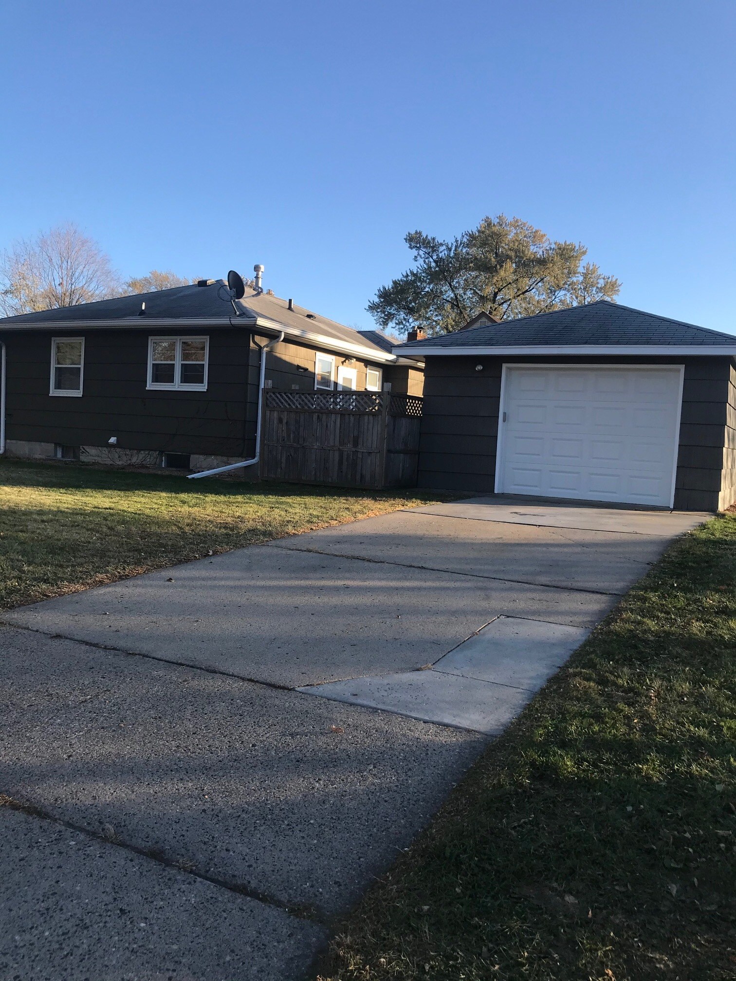 garage, oversized single car, concrete driveway - 6400 1st Ave S