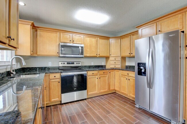 Building Photo - Four Bedroom with Bonus Room and a detache...