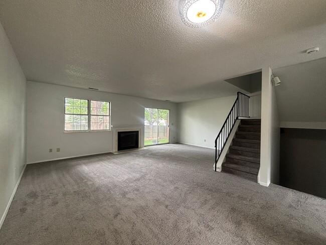 Building Photo - Large 2-story townhome with finished basement & 1-car garage!