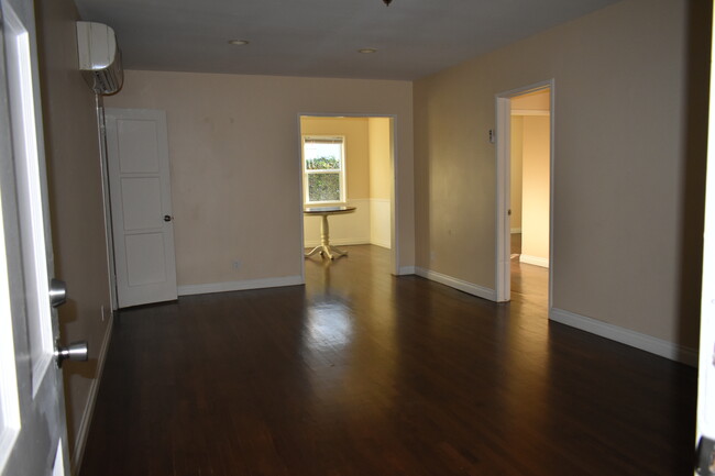 Living room area going to the dining room - 1438 S Sherbourne Dr