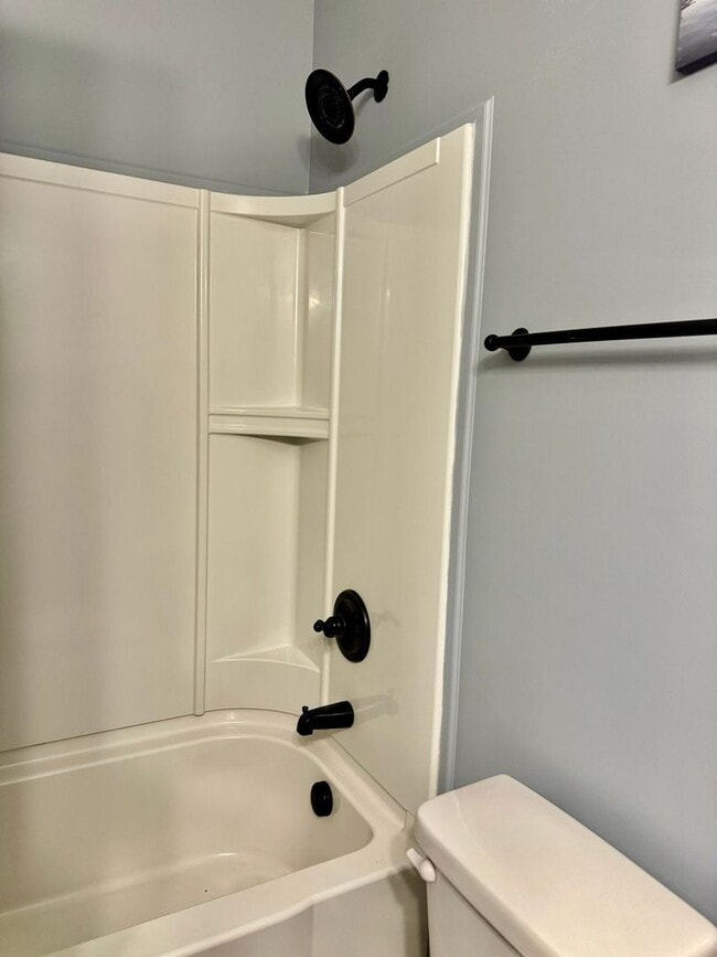 Building Photo - Large Open 4 Bedroom Home with Bonus! Tree Lined Backyard with Privacy Fence!