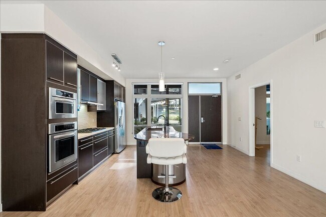 Building Photo - Resort Style Amenities in a Luxury, Modern 2 Bedroom Condo