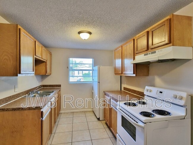 Building Photo - 7635 McCowan Dr