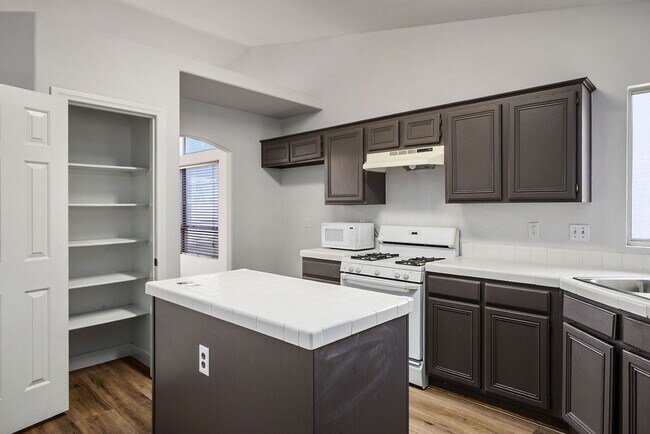 Building Photo - "Charming 3-Bedroom Oasis on Akamine Ave – Spacious 1702 Sq. Ft. with 2 Full Baths!"