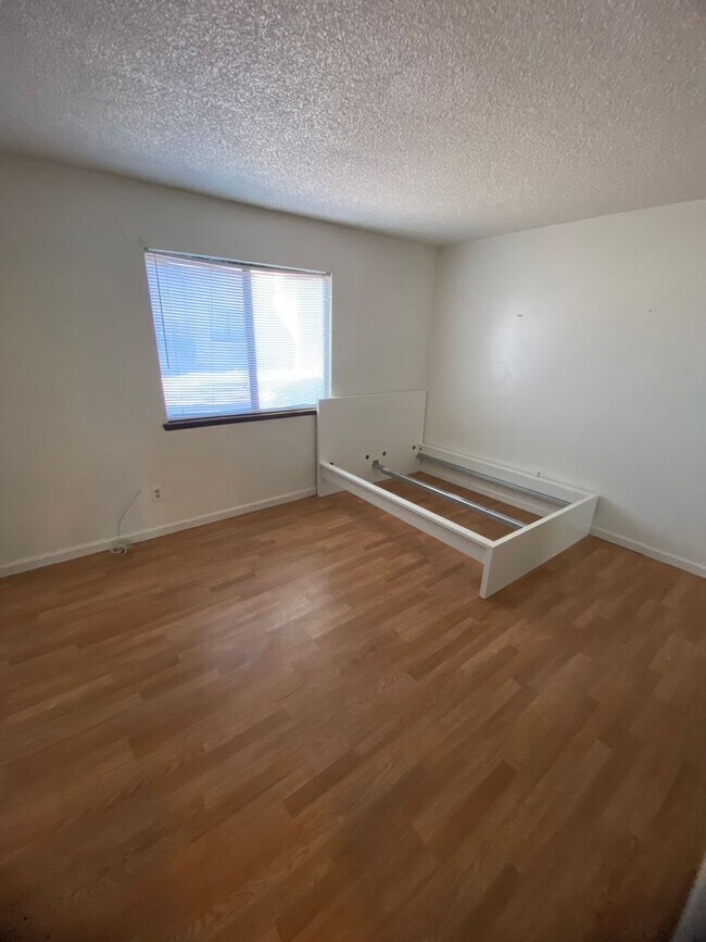Building Photo - AMERICANA Property Mgmt - Downstairs 2 Beds condo in Spring Valley