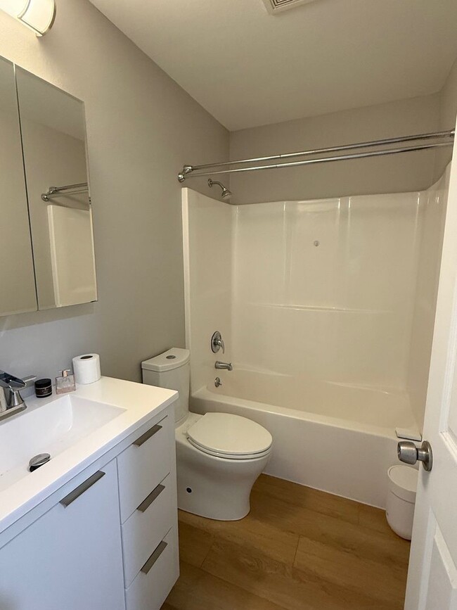 Building Photo - Updated 3BR Home with Luxury Vinyl Plank Flooring Throughout & Spacious Yard