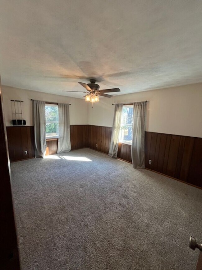 Building Photo - Spacious, Fully Updated Home with Walkout Basement on a Mature Lot