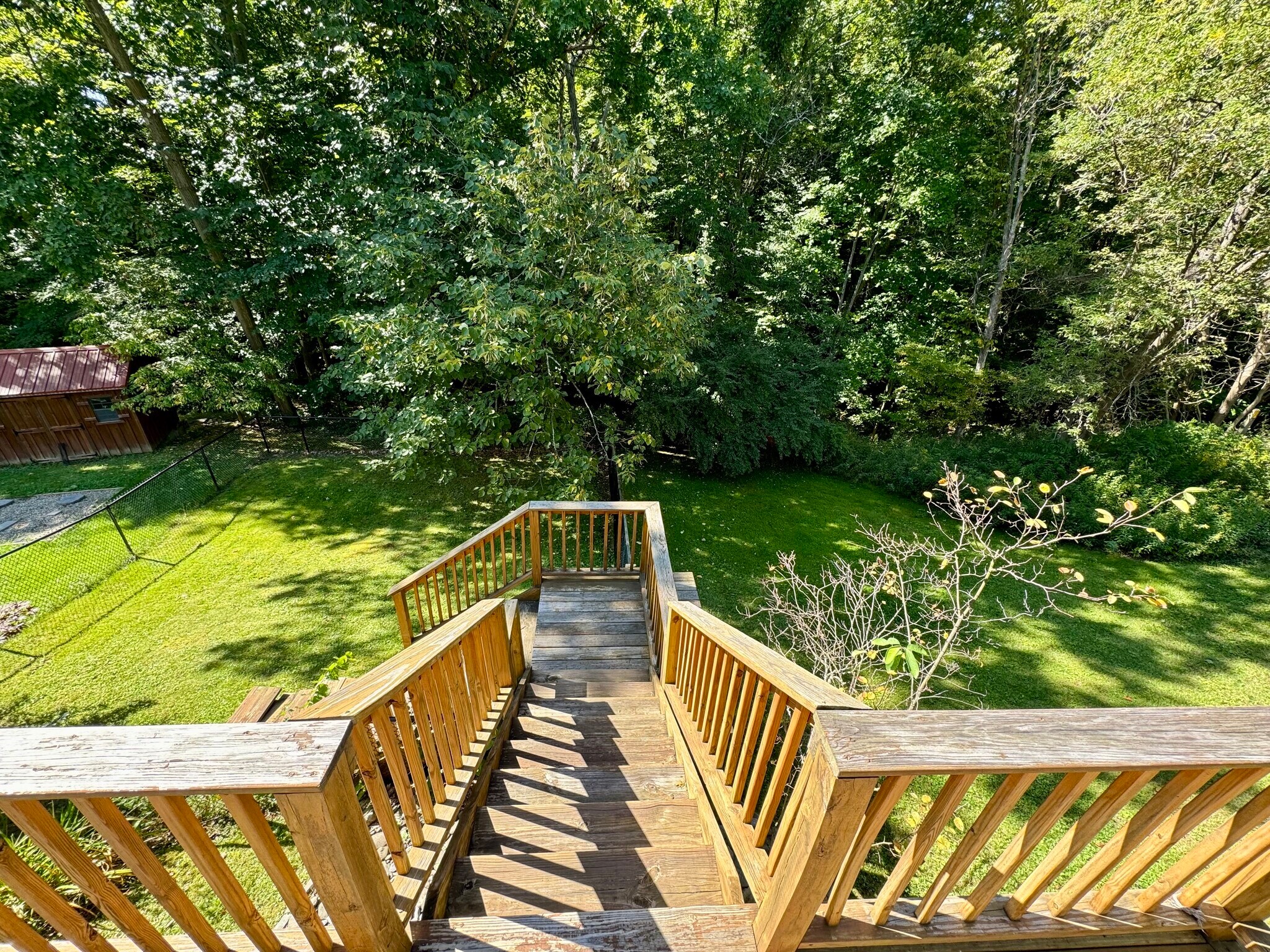 Back deck stairs to fenced in backyard - 113 Penny Ln