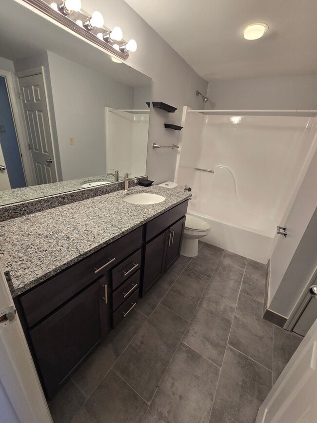 Building Photo - Beautifully renovated TWO-bedroom Condo on third floor with charm.