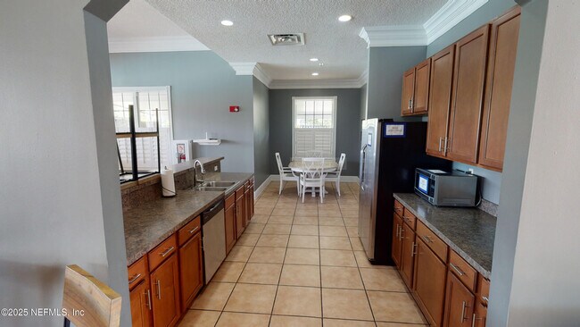 Building Photo - 8241 Pelican Landing Rd