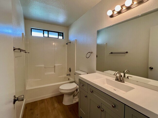 Building Photo - $1,000 Off First Month's Rent | 3-Bedroom Home with Detached 2-Car Garage, Fireplace & Private Patio