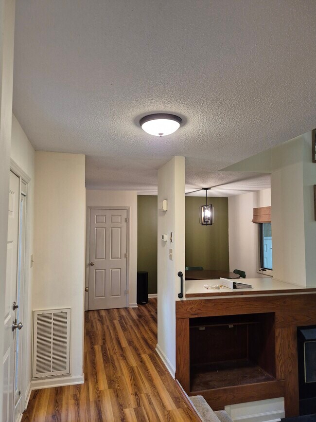 view of dining room and pantry from entryway - 4422 Beechnut Ln