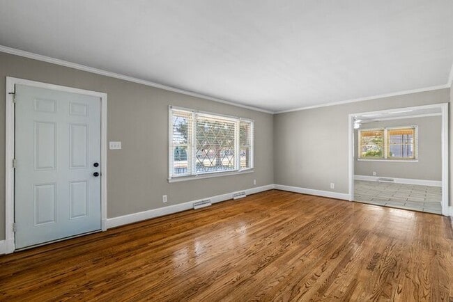 Building Photo - Elon - Large Brick Home, Hardwoods, Granite Counter-Tops, SS Appliances, Fire Place, Carport - Mu...