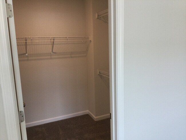 Master bedroom walk-in closet - 208 Hickory Plains Rd