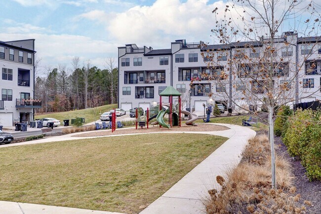 Building Photo - Three Story Brick End Unit with Rooftop Terrace