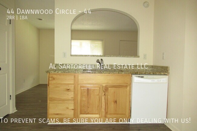 Building Photo - Pet Friendly Condo close to town and ready...