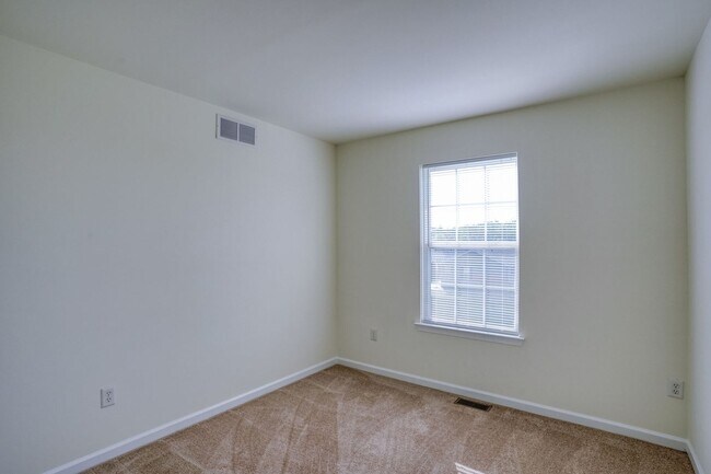 Building Photo - New, New, New - Spacious 3 Bedroom Townhouse with a Finished Basement !!