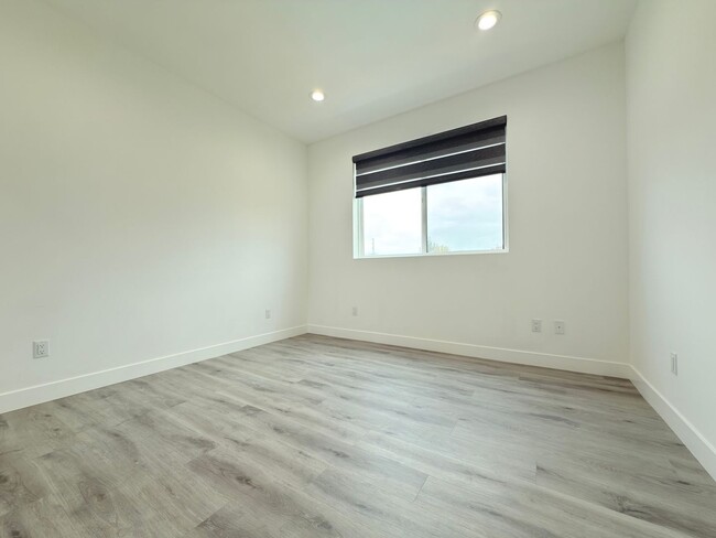 Building Photo - Chic Modern Living in Panorama City – 4 Be...