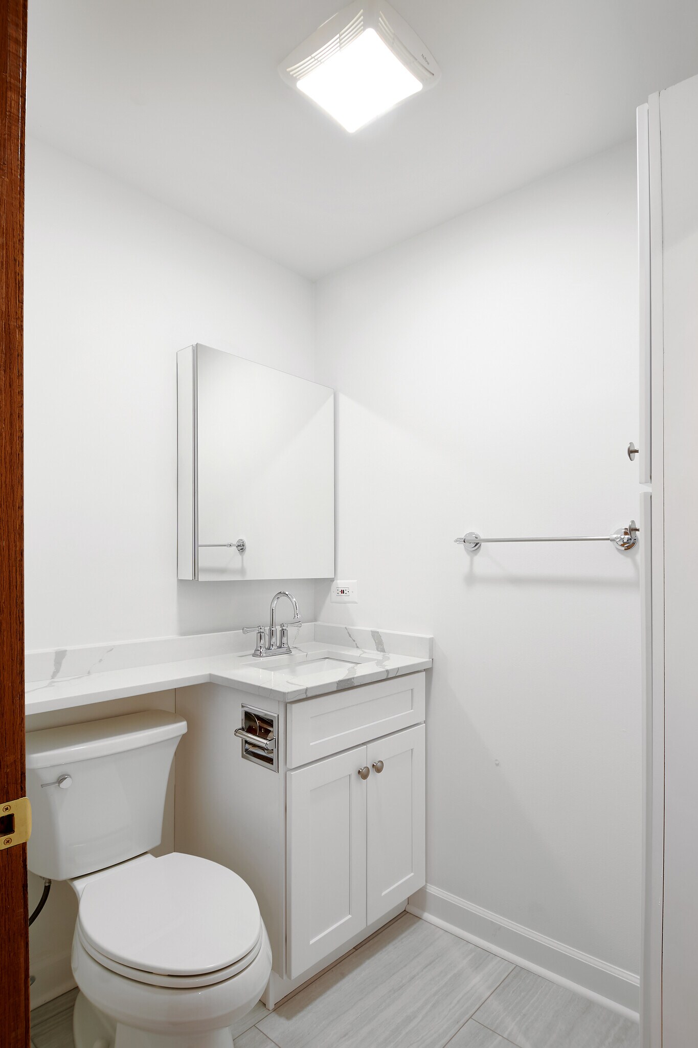 2nd Bathroom with Extended Quartz Counter and Storage - 5610 N Kenmore Ave