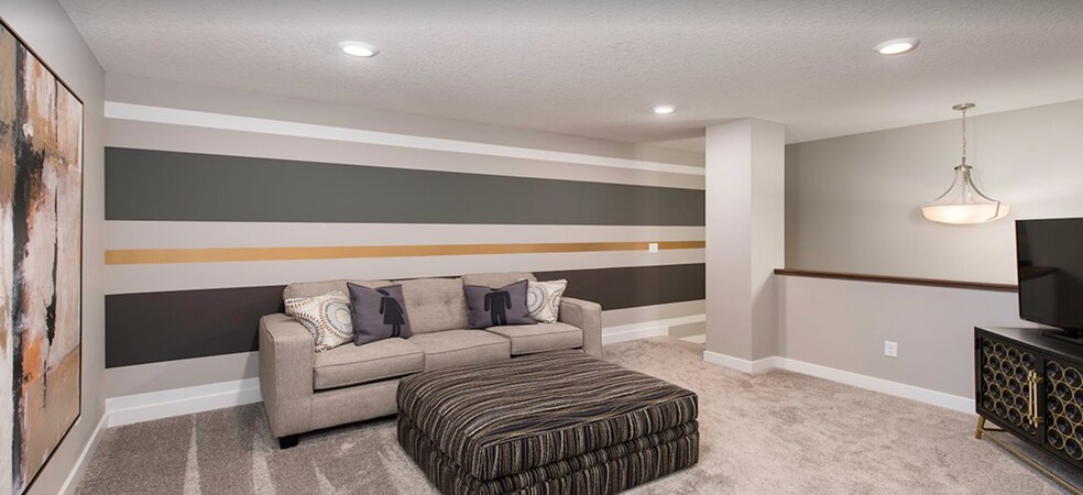 13 x 14 upper level loft offers bonus space to be used as media room, home office or study area. (model home picture shown for furniture placement) - 4825 Martingale Drive