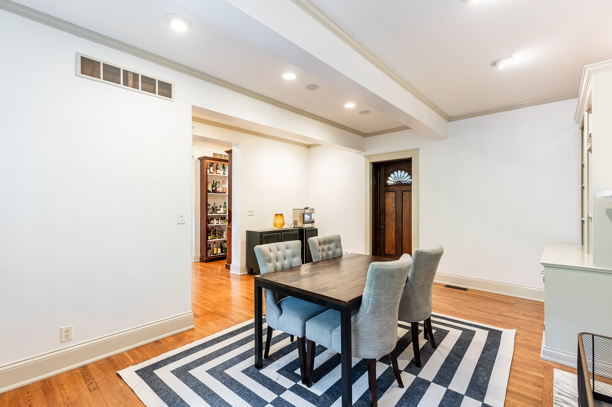 Informal dining room opens to den. - 4061 Beechwood Ave