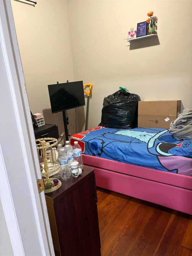 Building Photo - 121-123-123 W 25th St