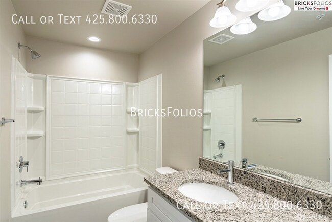 Building Photo - Welcome to Comfort and Charm in Your Monro...