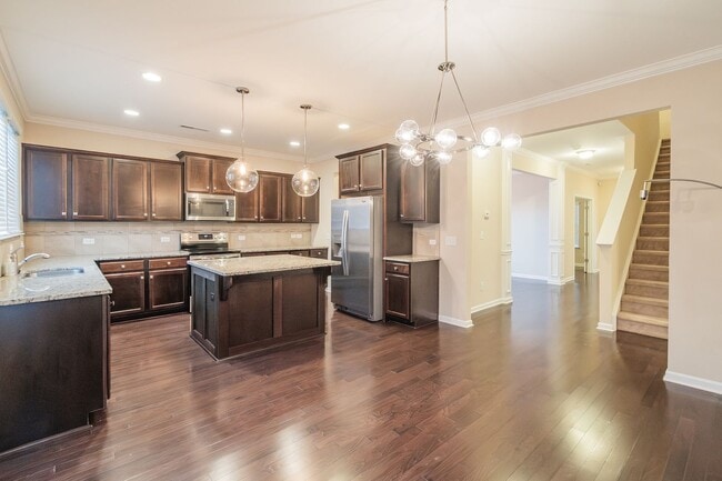 Building Photo - Third month rent free if you sign a lease before 01/31! Spacious 4 Bedroom, 3.5 Bath Home for Ren...