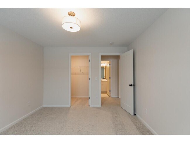 Building Photo - 13386 Fondant Trail N