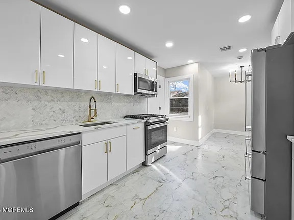 Building Photo - Beautifully Renovated Home in a Sought Aft...