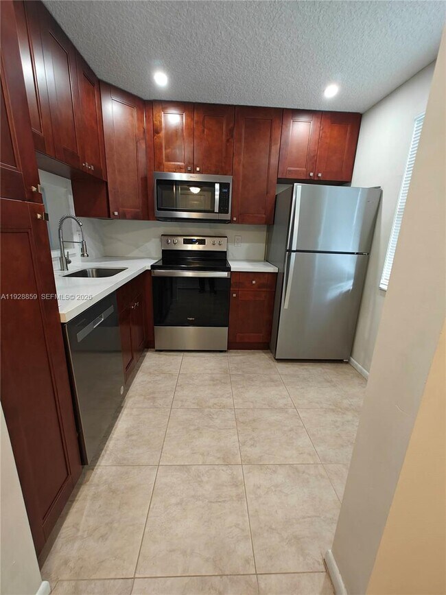 Building Photo - 8770 Royal Palm Blvd