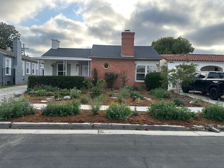 Building Photo - 8937 S Denker Ave